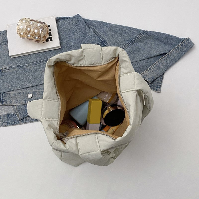 Padded shoulder bag with wave design Stornfield