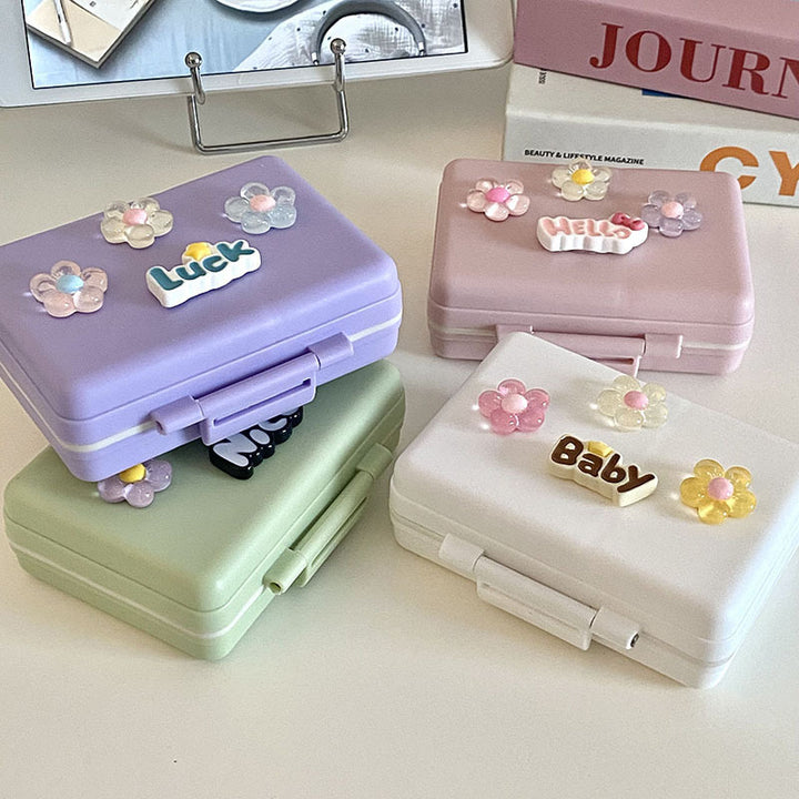 Practical storage box with colorful flower appliqués Stornfield
