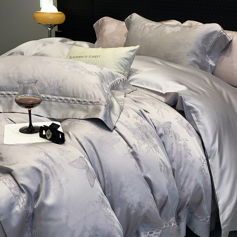Premium cotton satin bedding set with fine jacquard floral texture and piped border