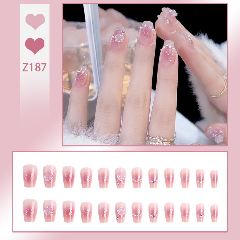 Artificial nail set with sparkling glitter and pearl decorations Stornfield