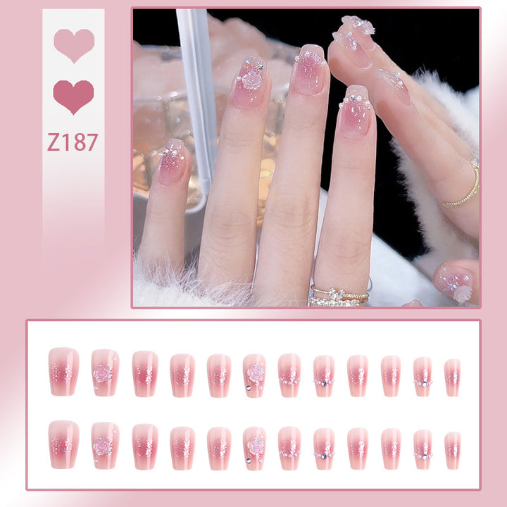 Artificial nail set with sparkling glitter and pearl decorations Stornfield