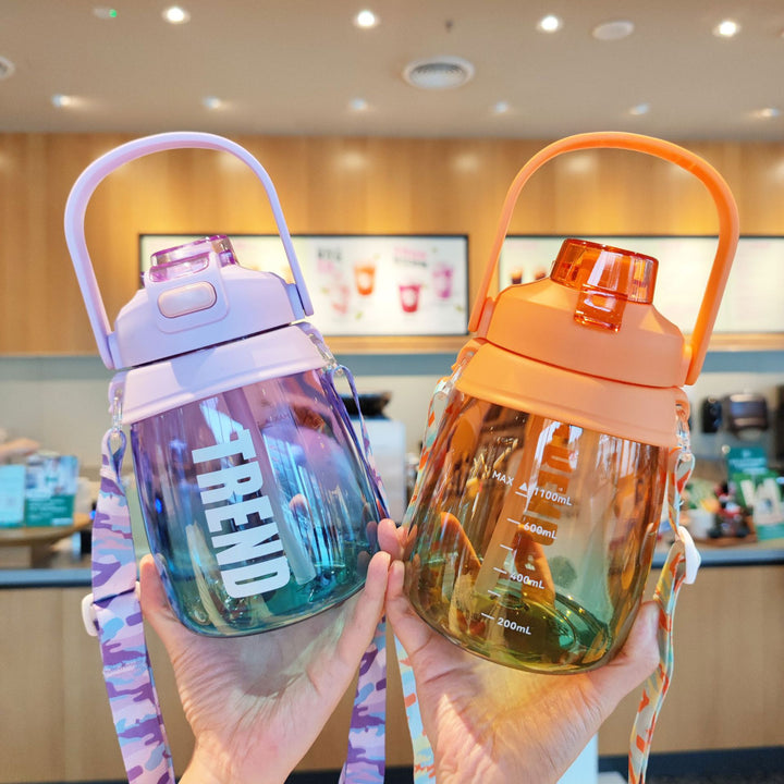 Women's multifunctional water bottle with safety closure and ergonomic carrying handle Stornfield