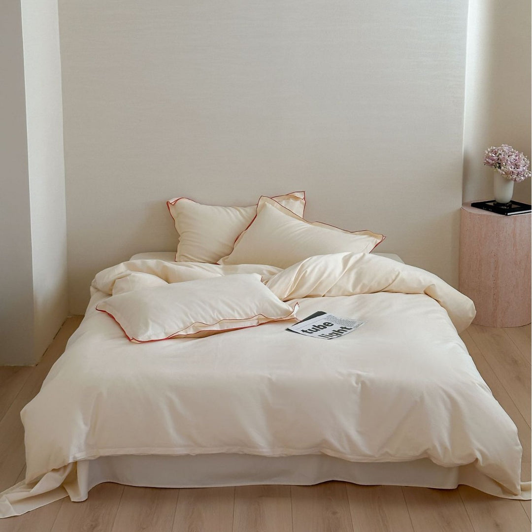 Reversible Cotton Sateen Duvet Cover Set with Contrast Piping and Pillow Shams