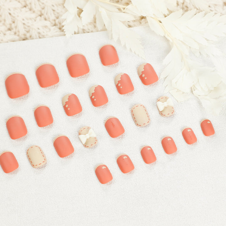Artistic nail nails with decorative bow designs and French tips Stornfield