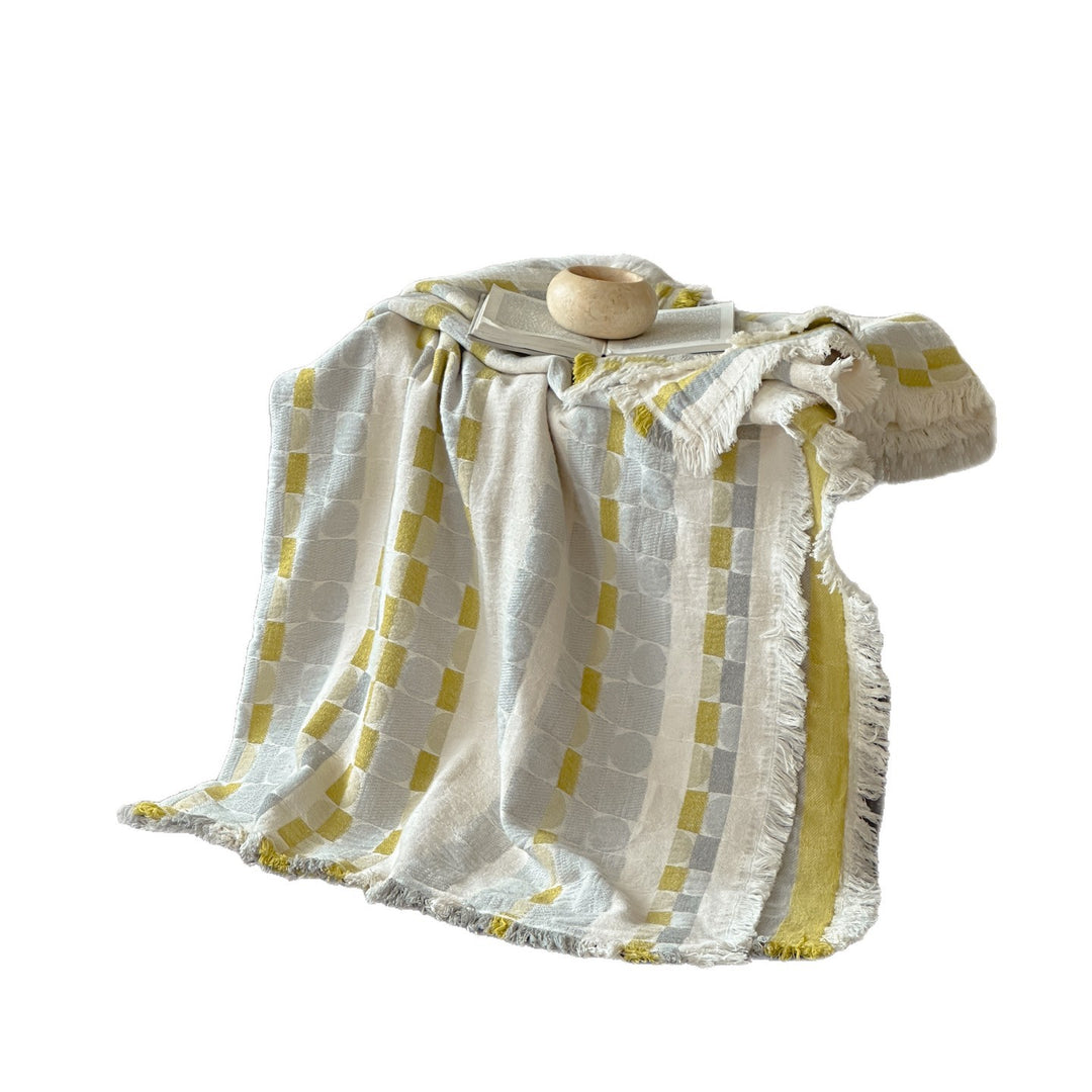 Generous cotton-linen throw blanket with geometric pattern and fringes