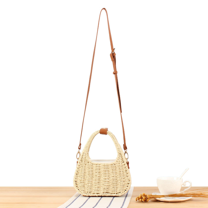 Shoulder bag made of woven natural material with elegant leather accent Stornfield