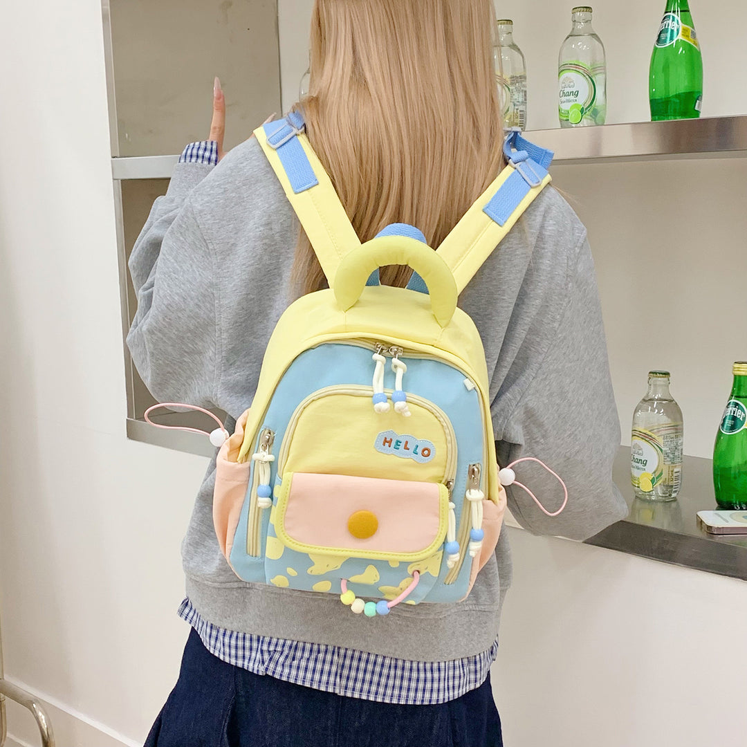 Leisure Backpack with Colorful Applications and Creative Design Stornfield