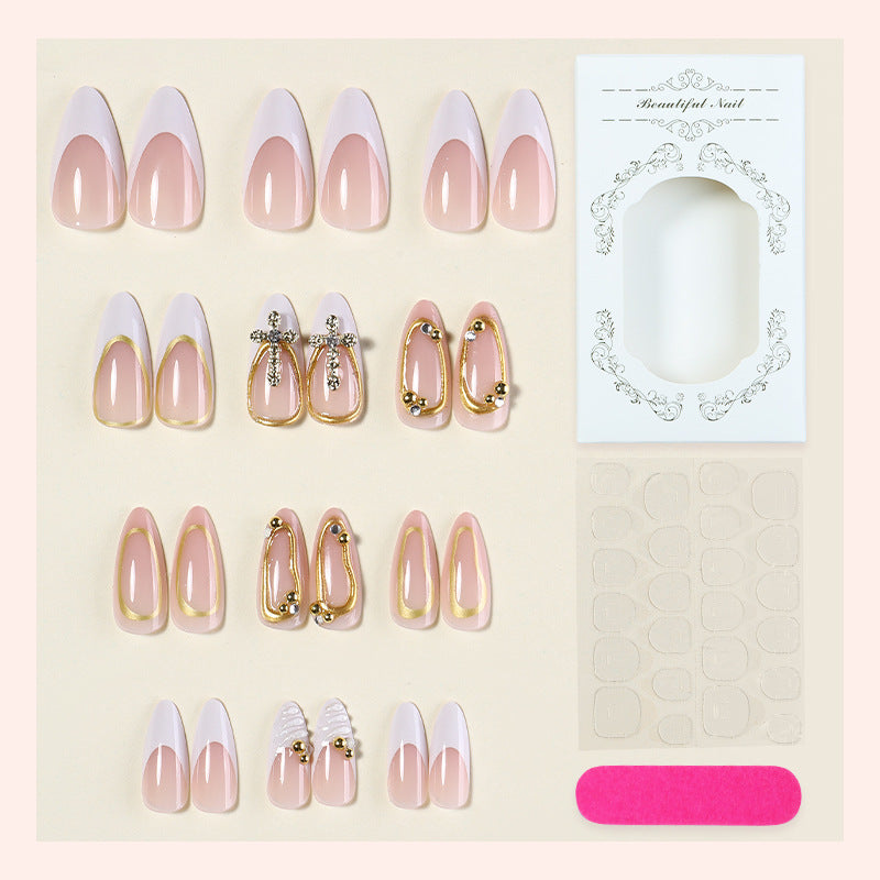 Artificial nail set with luxurious gold embellishments and elegant designs Stornfield