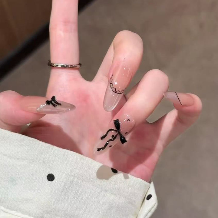 Artistic Press-On Nail Set with Elegant Bow and Pattern Details Stornfield