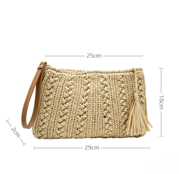Woven natural material handbag with tassel Stornfield