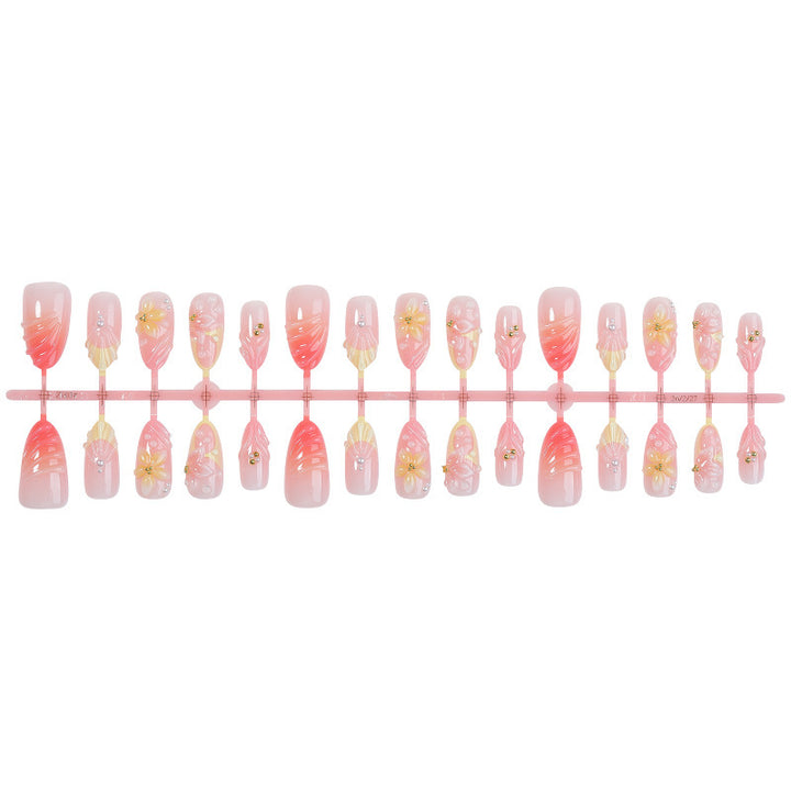 Creative nail art set with delicate flower and decorative elements Stornfield