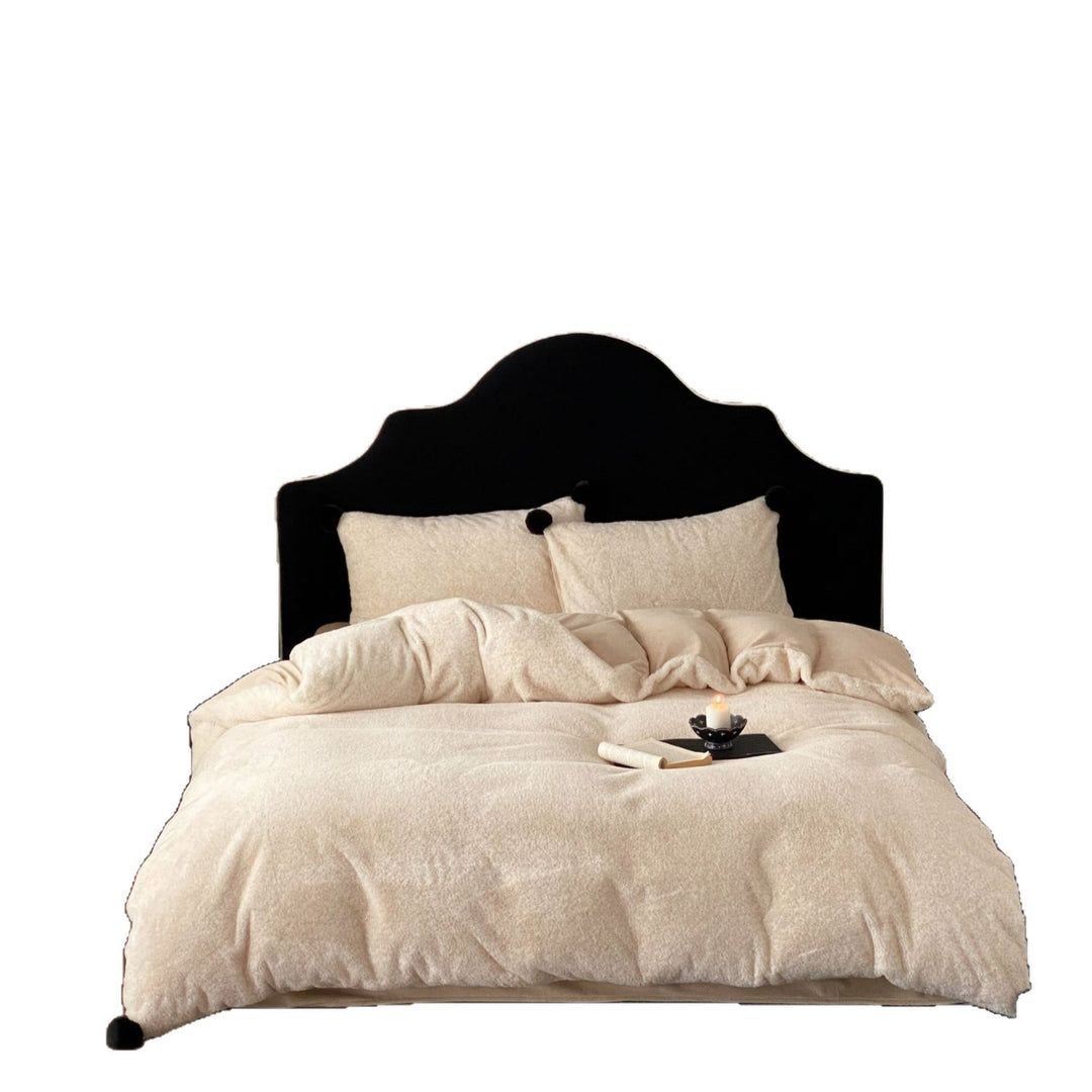 Bedding set made of soft cotton blend with decorative pom poms and reversible back