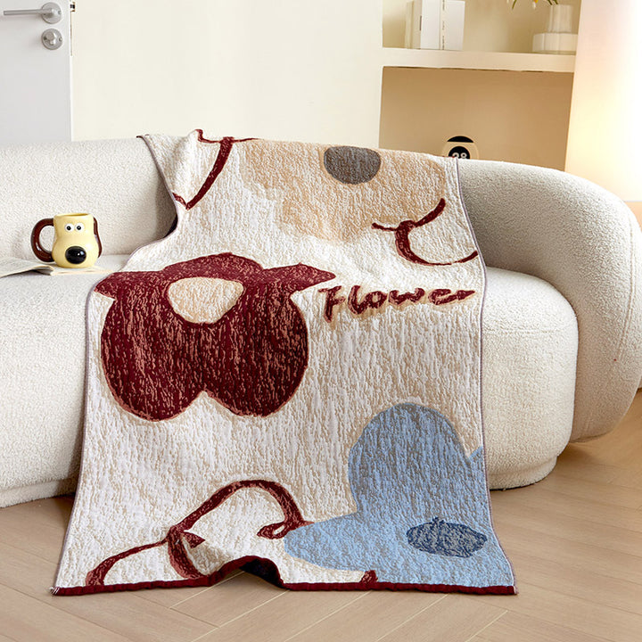 Cozy jacquard throw blanket with cute dog and cat motifs