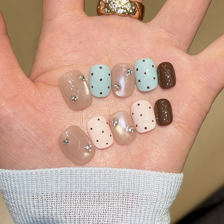 Acrylic nails with rhinestones and glitter Stornfield