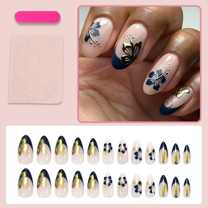 Acrylic nail set with unique flower and gold decorations Stornfield