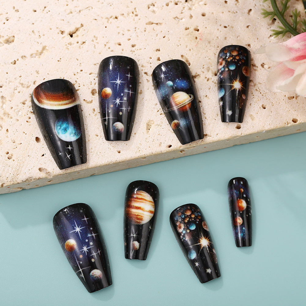 Artificial nails with galactic motifs Stornfield