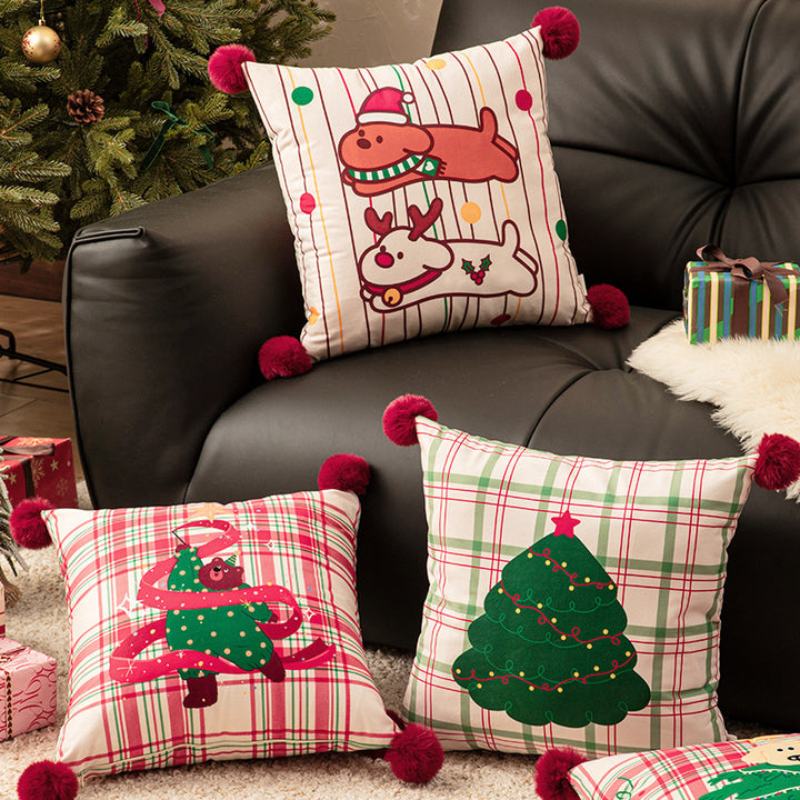 Square Christmas decorative cushion with pom-pom corners and printed dog design