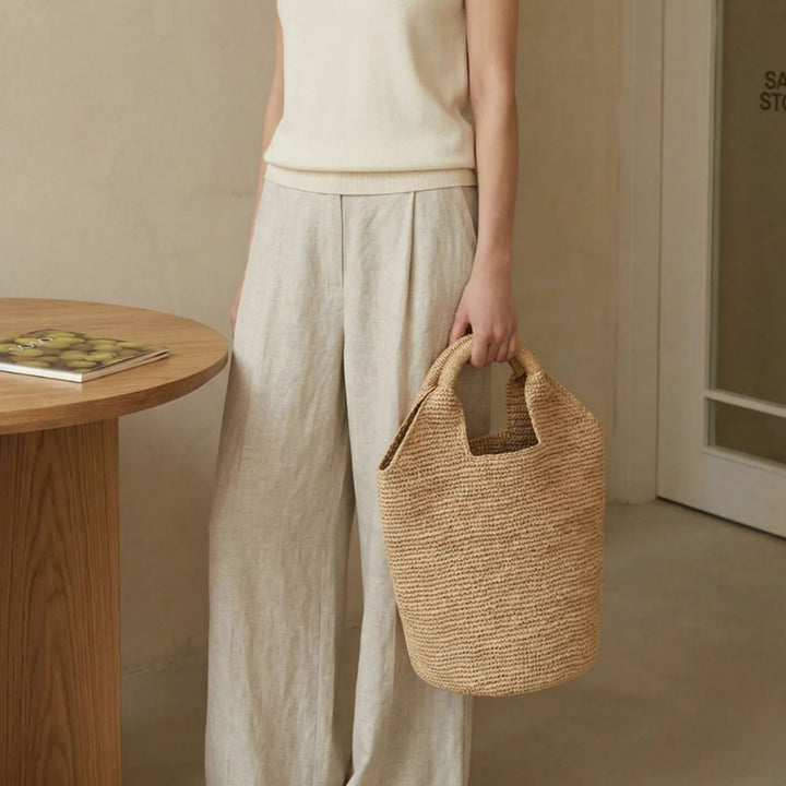 Beach bag made of natural raffia with practical handles Stornfield