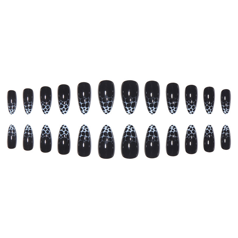 Stiletto Nail Art with Abstract Patterns Stornfield