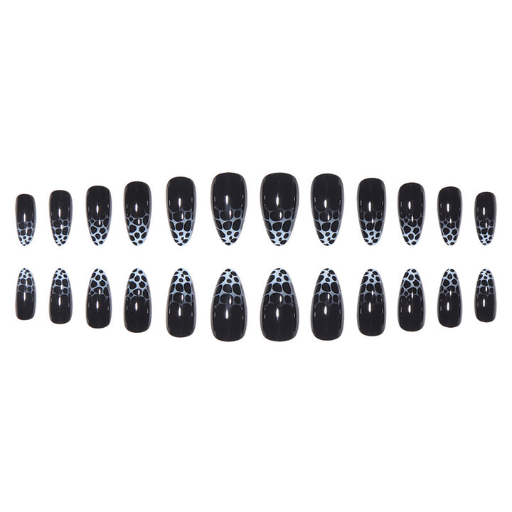 Stiletto Nail Art with Abstract Patterns Stornfield