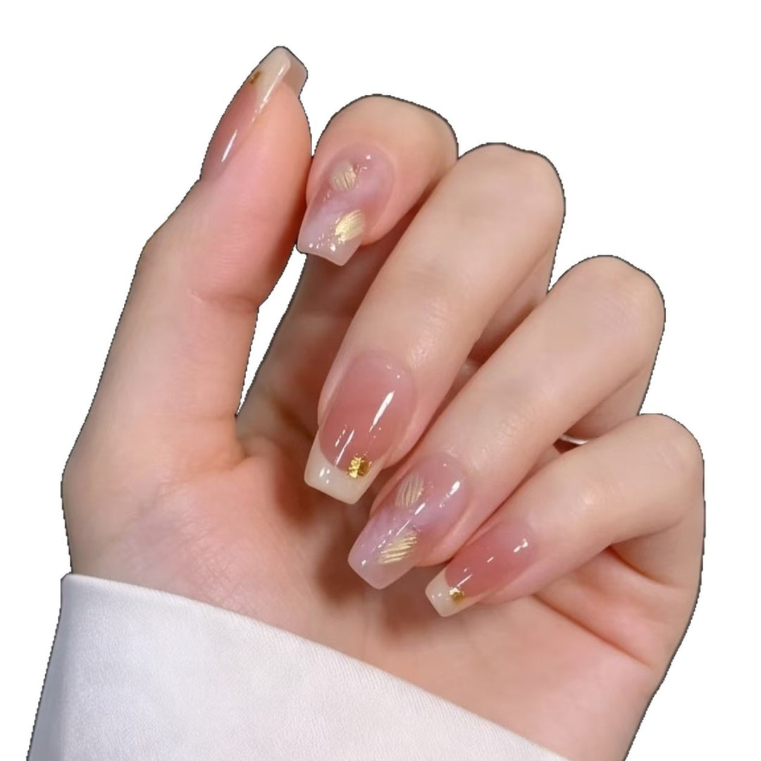 Elegant French Tip Nail Extensions with Gold Accents