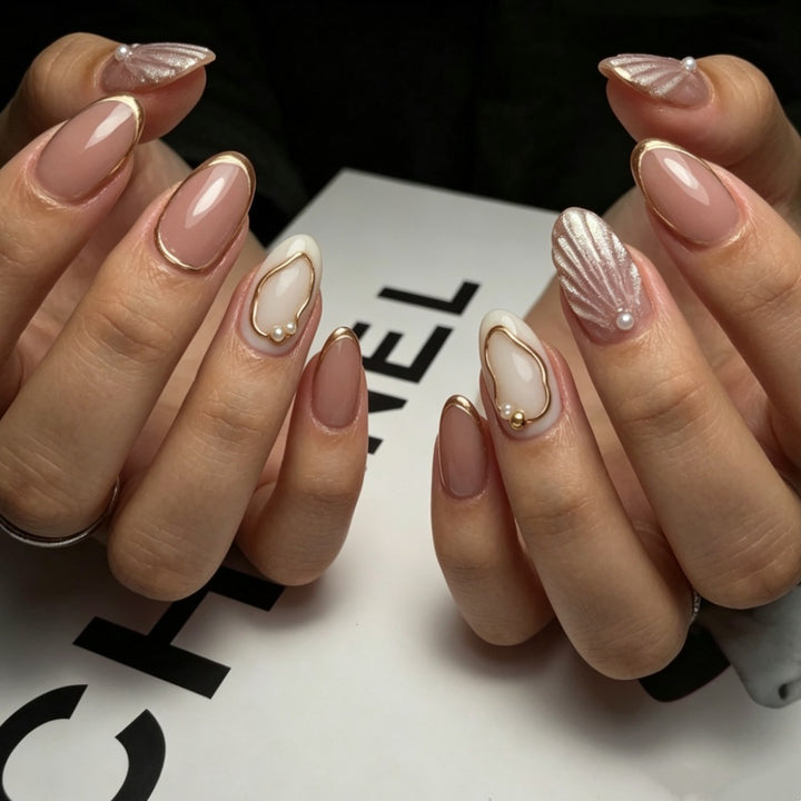 Artistic Press-On Nail Design with Gold Embellishments Stornfield