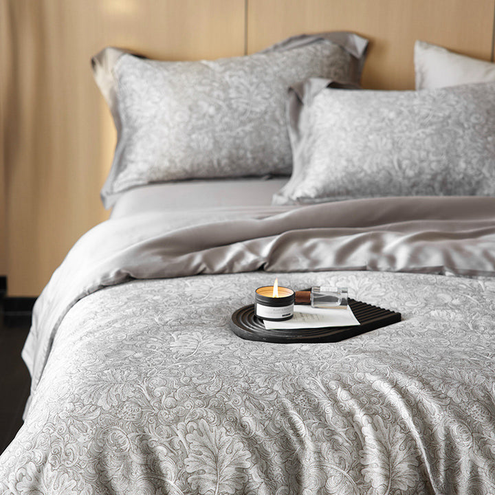 Reversible satin bedding set with floral watercolor print and silky matte surface
