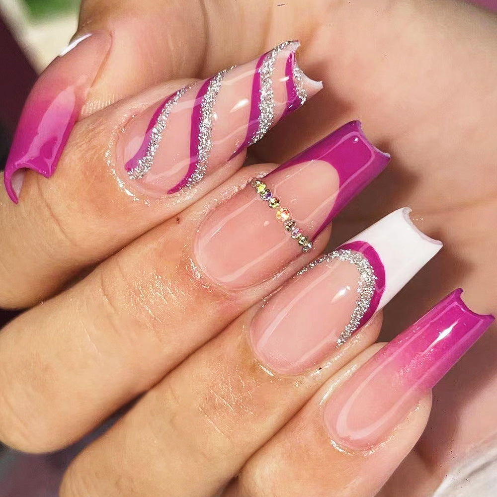 Artistic Nail Extensions with Glitter and Gradient Stornfield