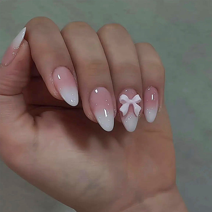 Acrylic Nail Set with Elegant Bows and Glamorous Accent Stornfield