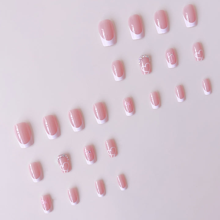 Elegant Nail Art Set with Heart Designs and Rhinestone Details Stornfield