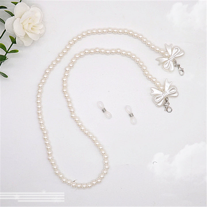 Elegant pearl glasses chain with bow pendants Stornfield