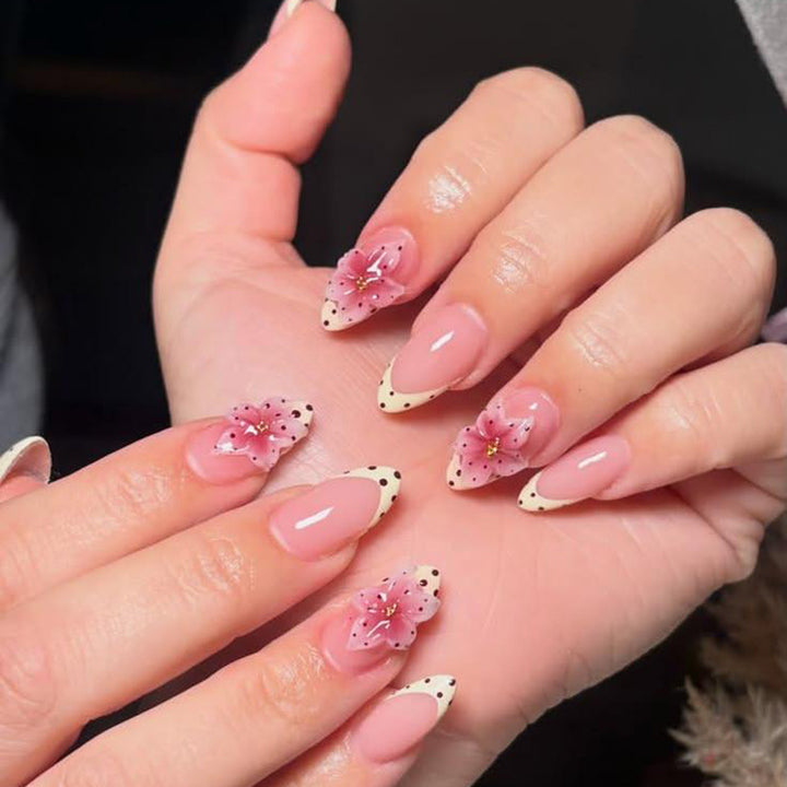 Artificial nails with floral design and elegant accents Stornfield