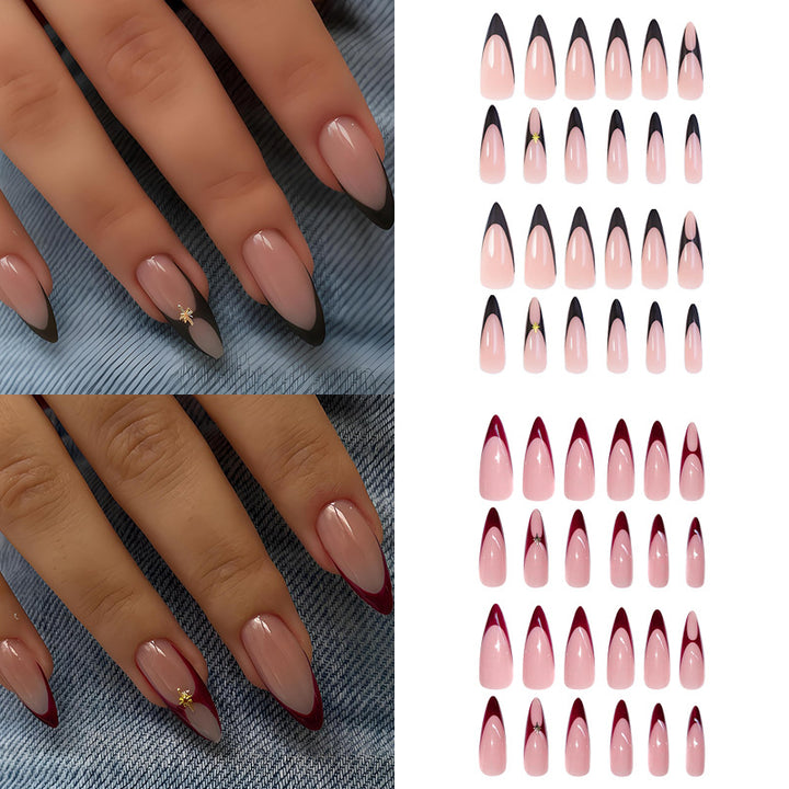 Acrylic nail set with elegant French tip and decorative accents Stornfield
