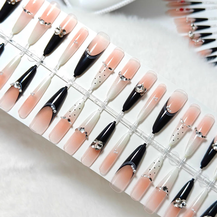 Elegant Artificial Nails with Glitter Accents and Fashionable Design Stornfield