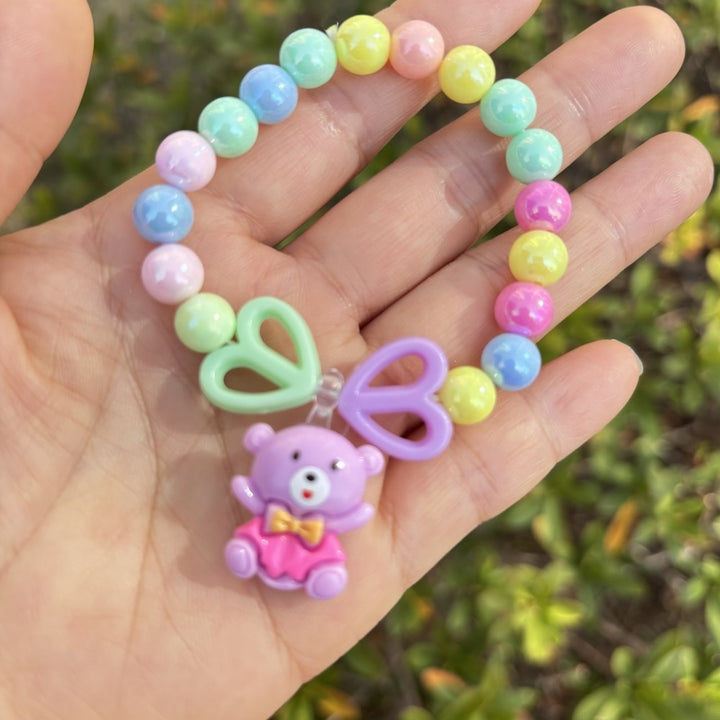 Colorful bracelet with flower charms Stornfield