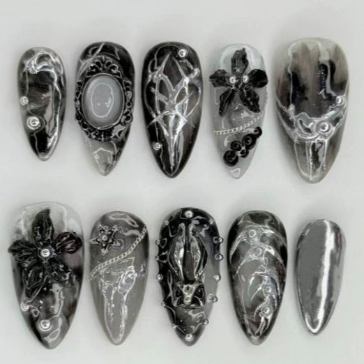 Artificial nail tips with glamorous black-and-white design Stornfield