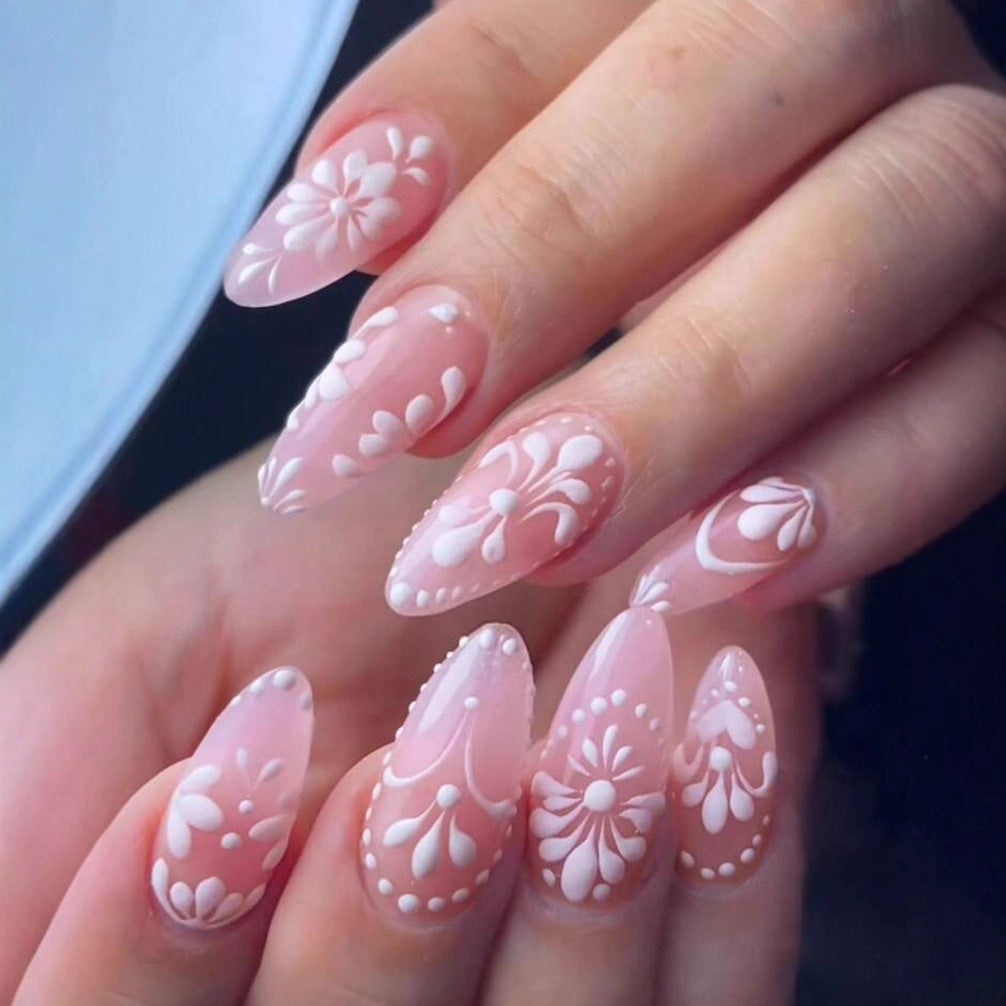 Nail art set with delicate flowers and elegant contours Stornfield