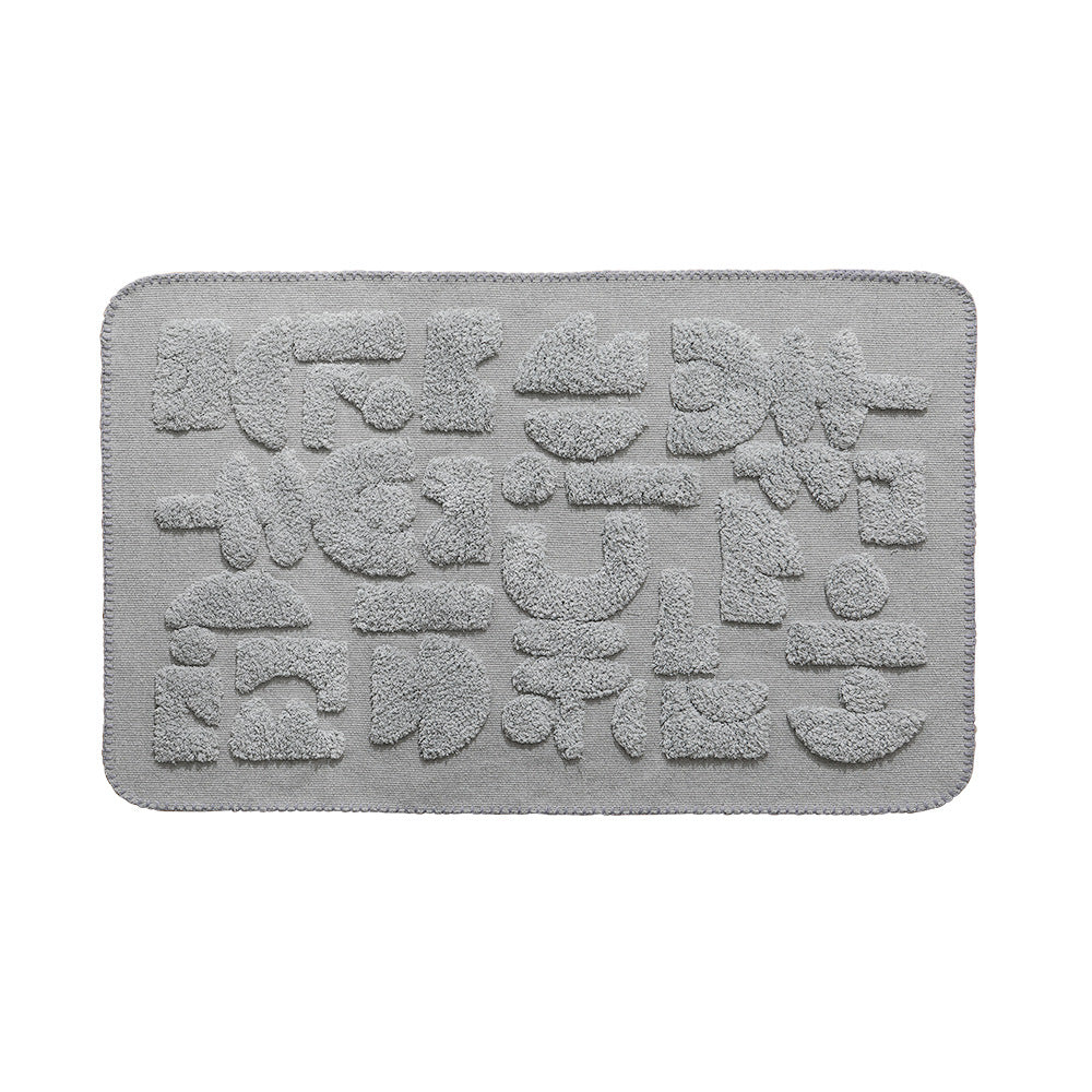 Luxurious organic cotton bath mat with relief pile structure Stornfield