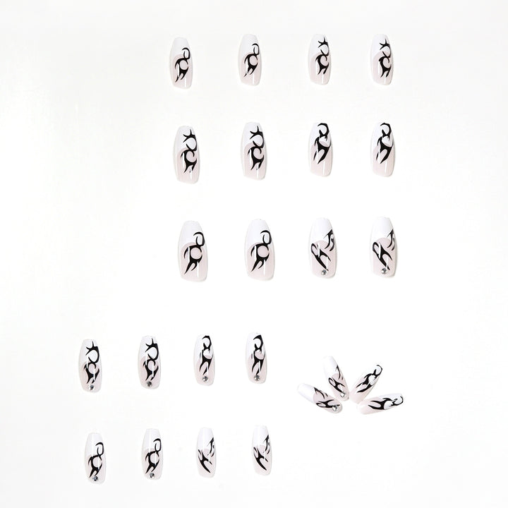 Elegant Artificial Nails with Decorative Black and Glitter Accents Stornfield