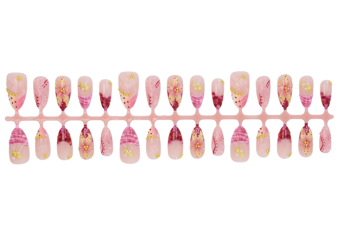 Fake nail set with floral patterns and luxurious embellishments Stornfield