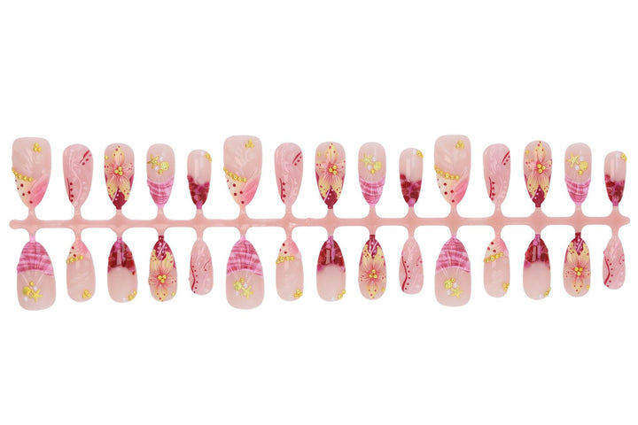 Fake nail set with floral patterns and luxurious embellishments Stornfield