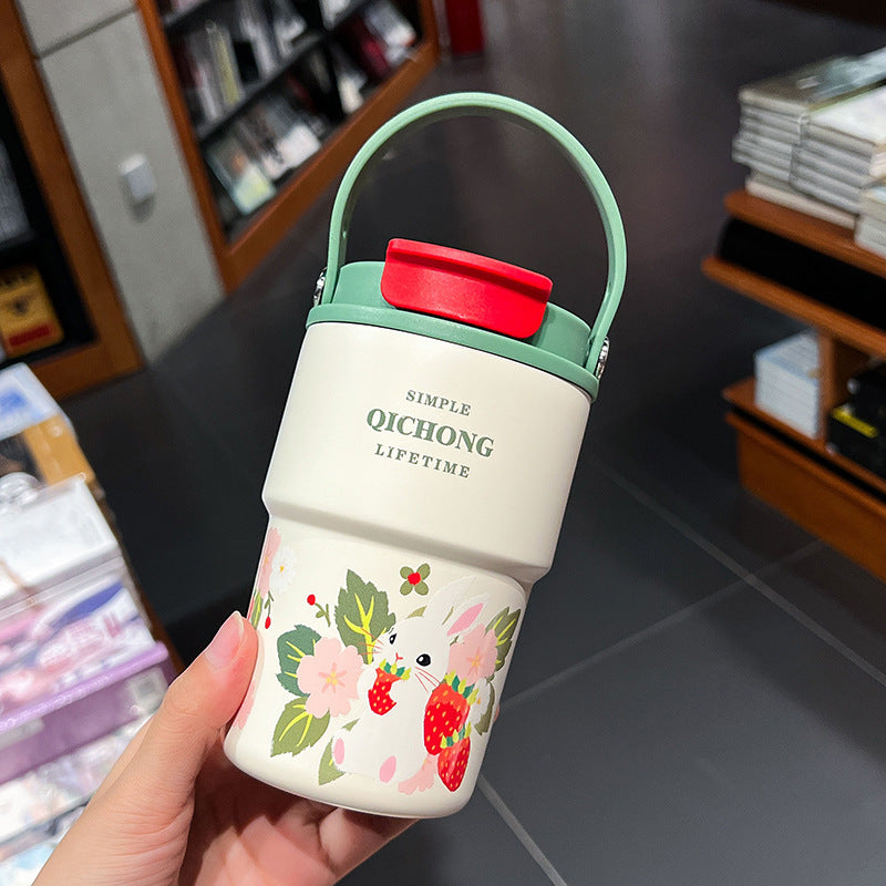 Women practical insulated drinking bottle with integrated carrying handle Stornfield