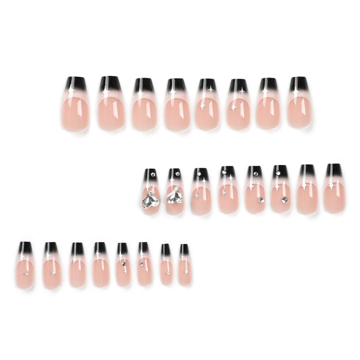 Artificial nail extensions with elegant ombre design and glitter accents Stornfield