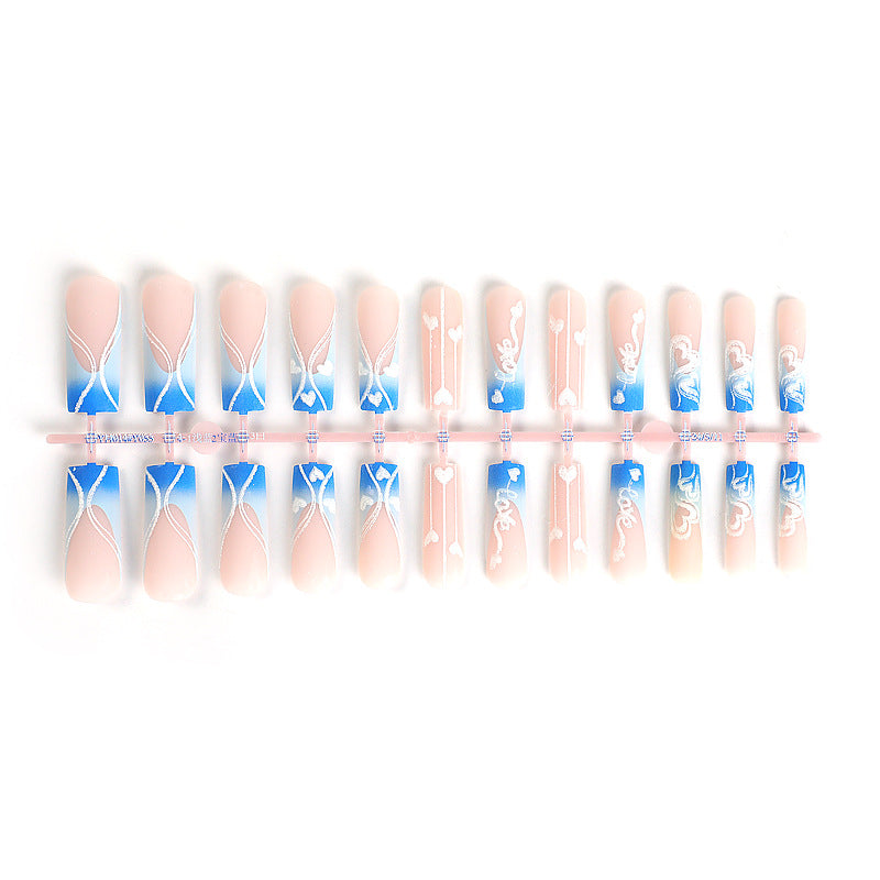 Creative nail art set with elegant heart and gradient patterns Stornfield