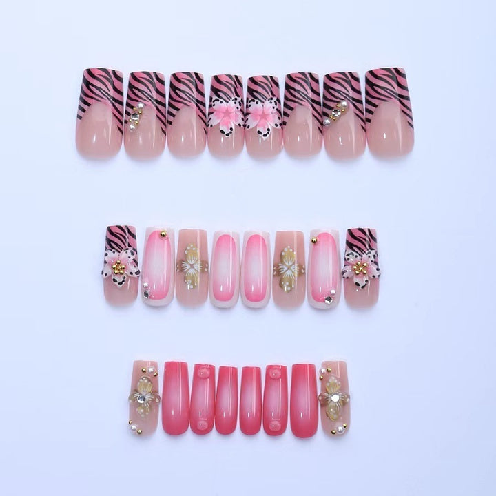 Artificial nail set with floral and glamorous decorations Stornfield