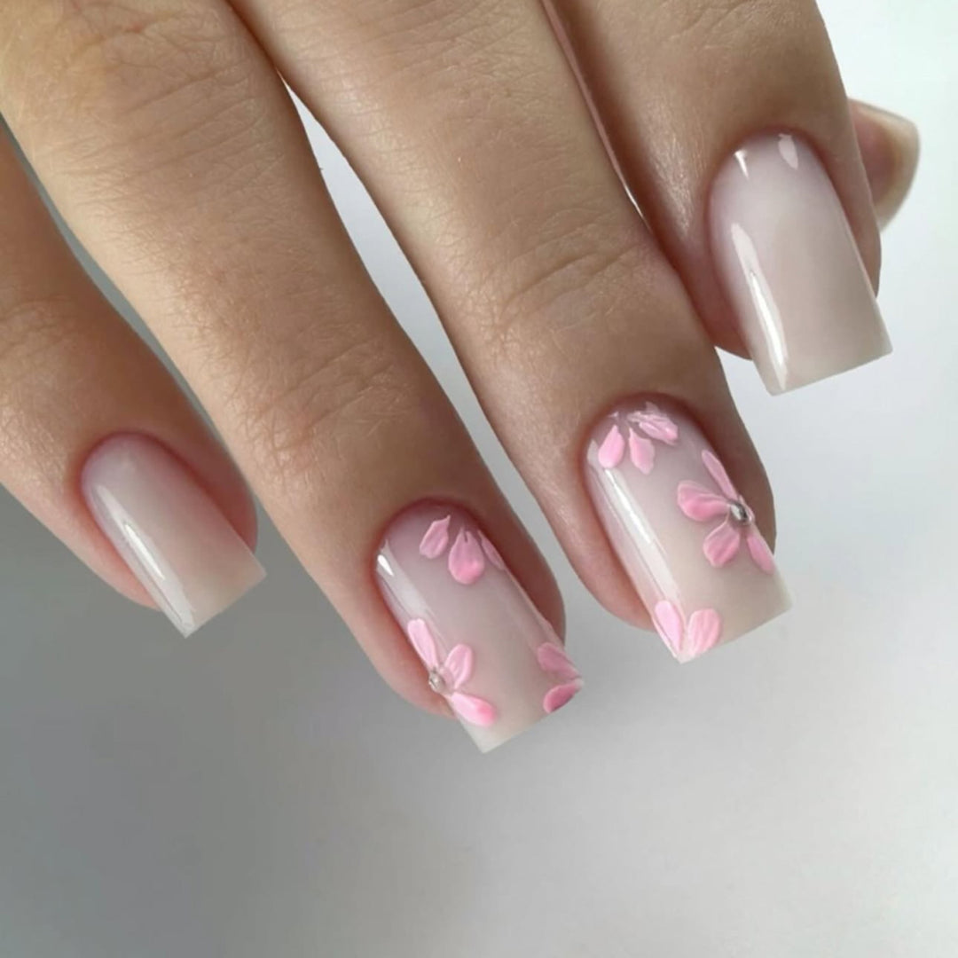 Artful Nail Art with Delicate Flower Patterns Stornfield