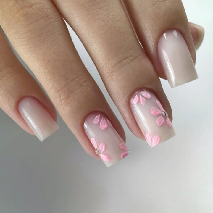 Artful Nail Art with Delicate Flower Patterns Stornfield