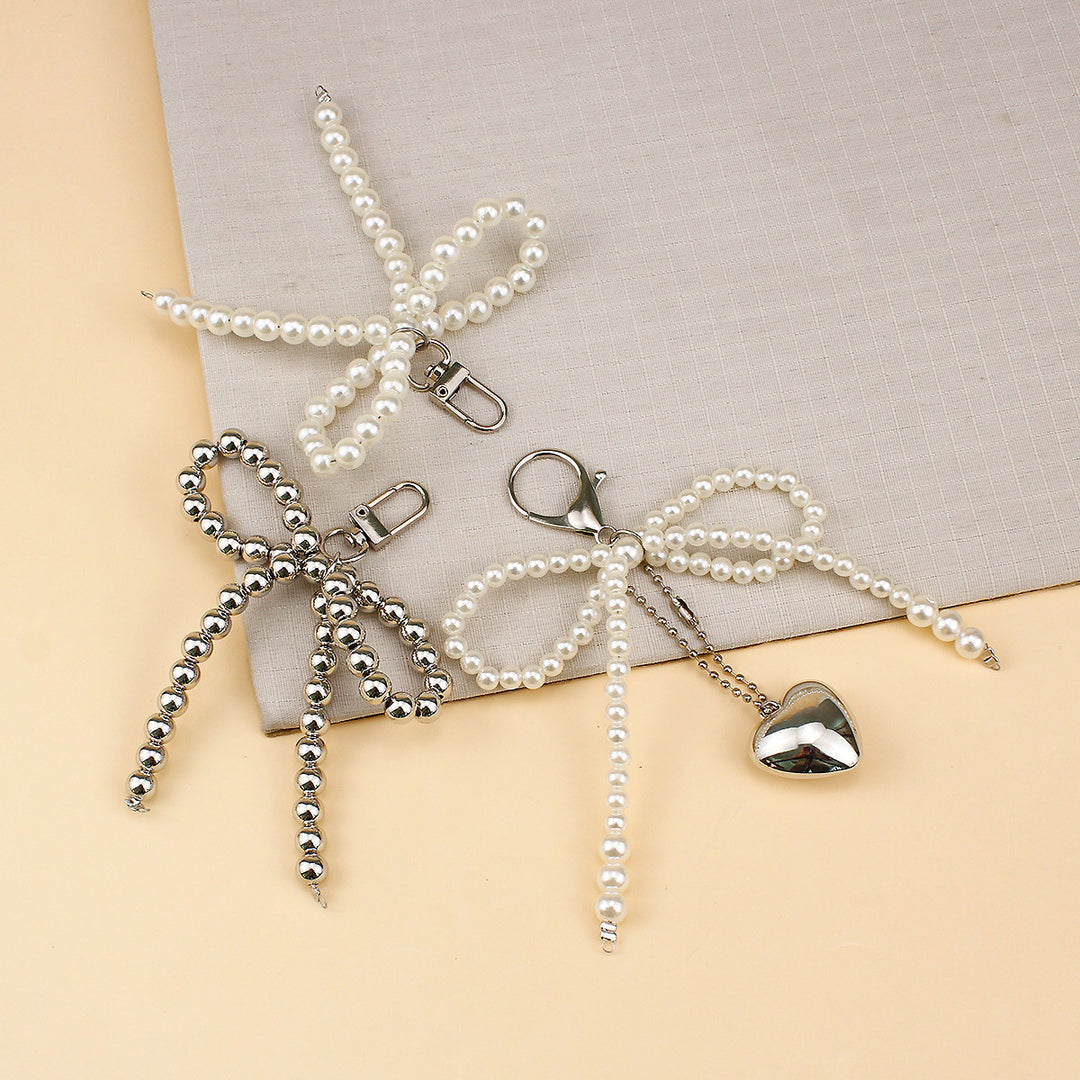 Elegant Pearl Bow Brooch Stornfield
