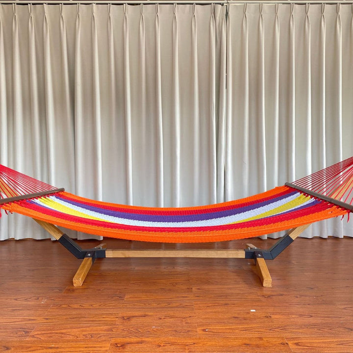 Woven cotton hammock with wooden spreader bars and freestanding stand Stornfield