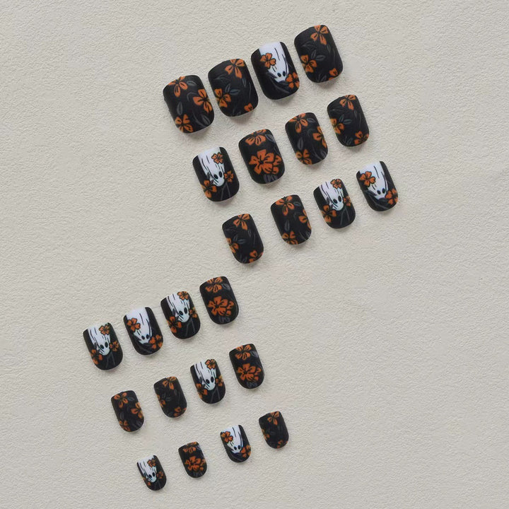 Acrylic nail set with spooky ghost design and floral accents Stornfield